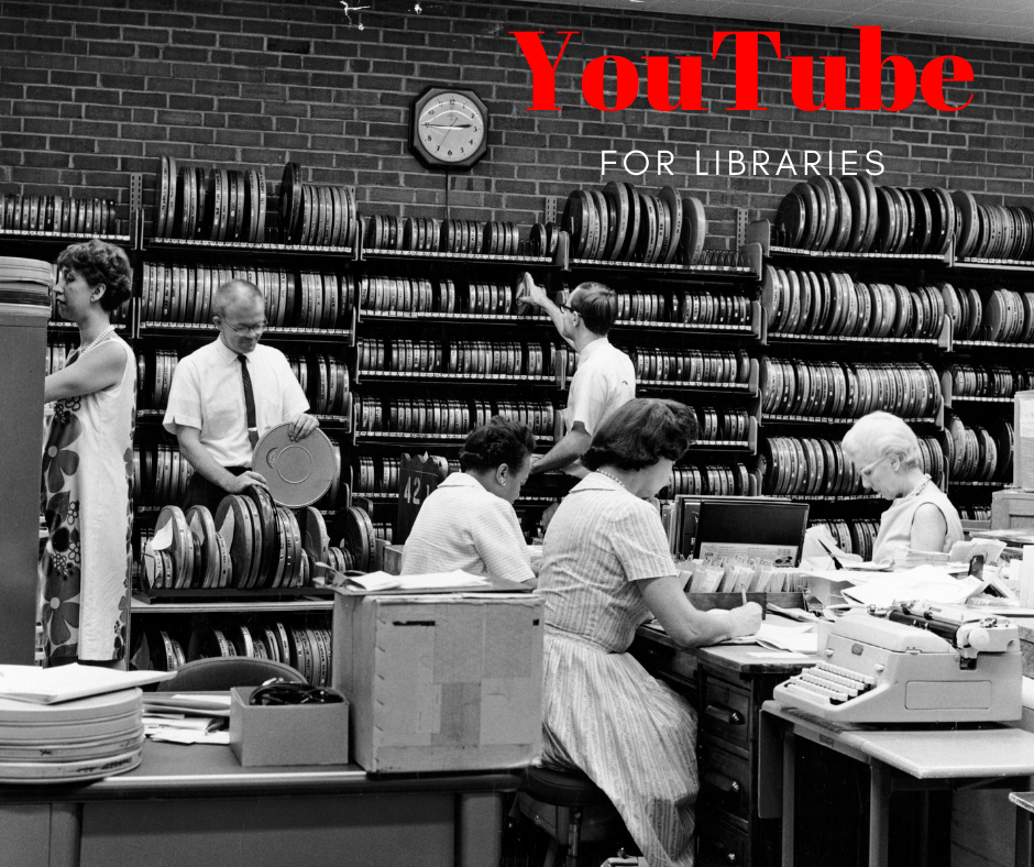 Library employees, including men and women, sorting film canisters in the 1960s.
