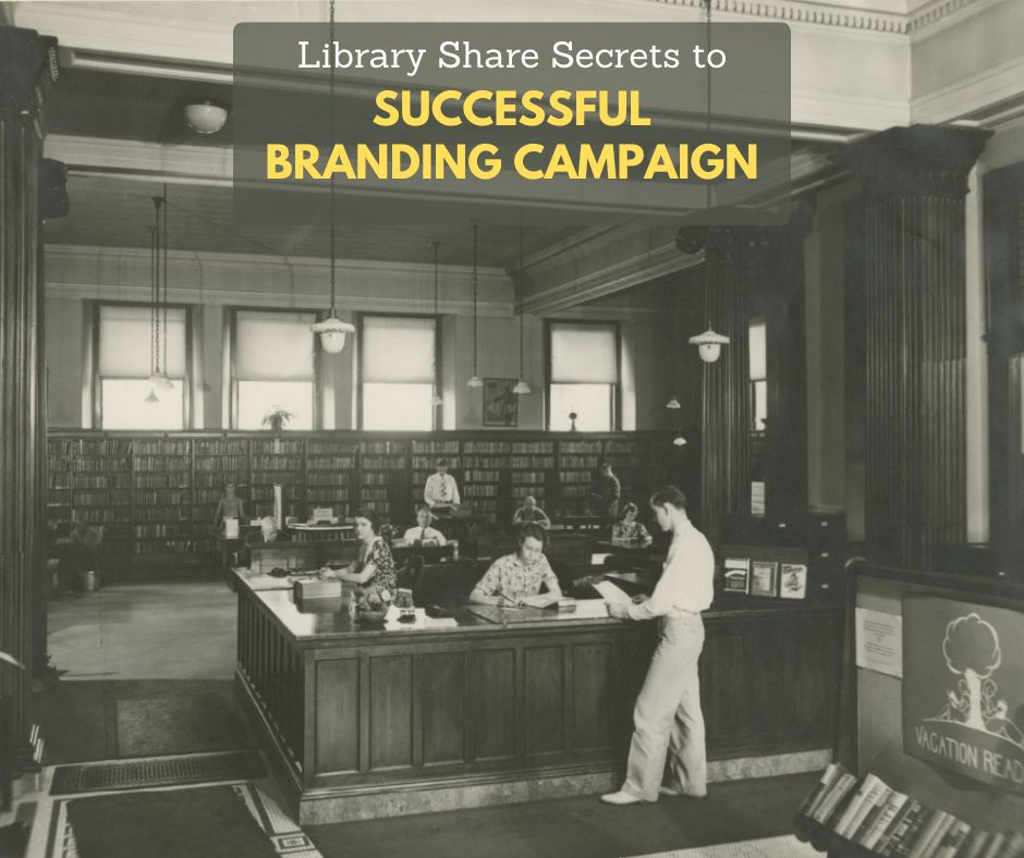 **Alt text:**
A black-and-white historic photo of a library interior with tall windows, hanging light fixtures, bookshelves, and a large wooden service desk where several people are working and browsing. A translucent gray text box at the top reads, “Library Share Secrets to SUCCESSFUL BRANDING CAMPAIGN,” with “SUCCESSFUL BRANDING CAMPAIGN” in large yellow letters.
